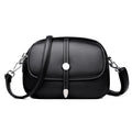 Women's crossbody shoulder bag in oval suitcase shape with soft PU construction