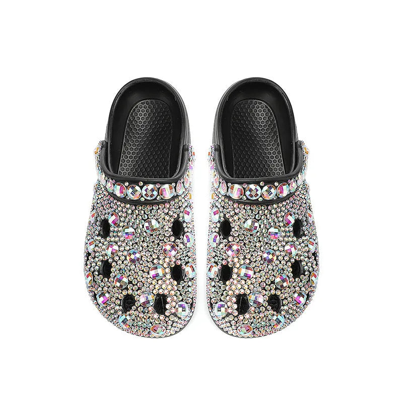 Black women's platform sandals with rhinestone detail and hole design on EVA upper