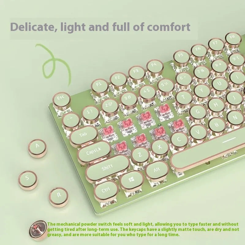 Matcha green 87-key mechanical gaming keyboard with aluminium frame and white backlighting on a desk.