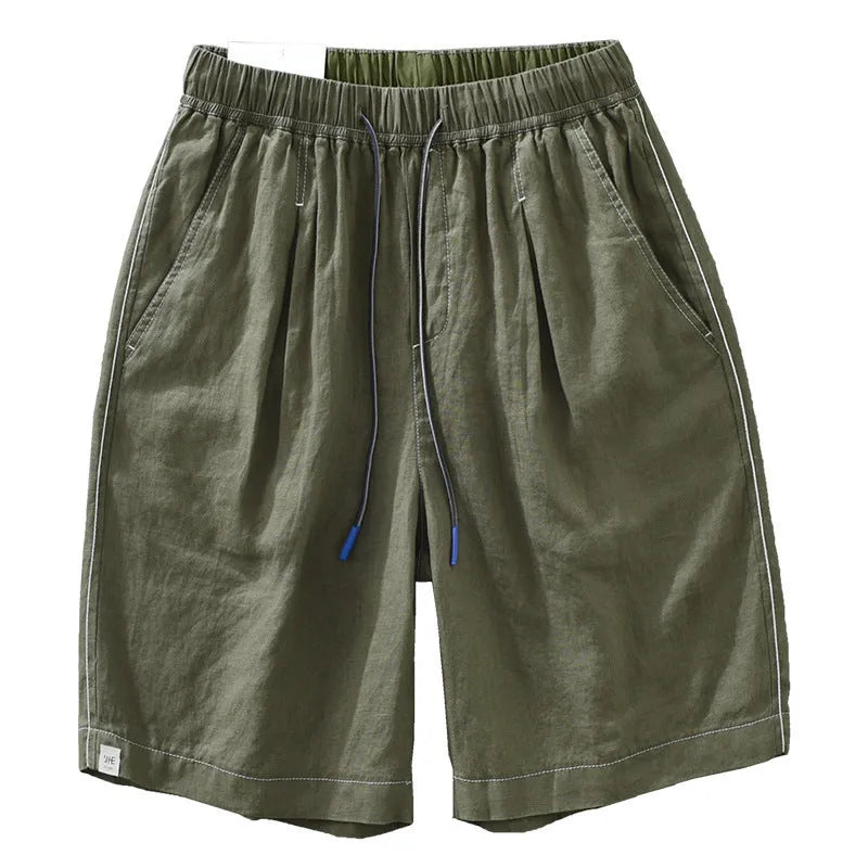 Men's green linen straight shorts with drawstring waist on hanger