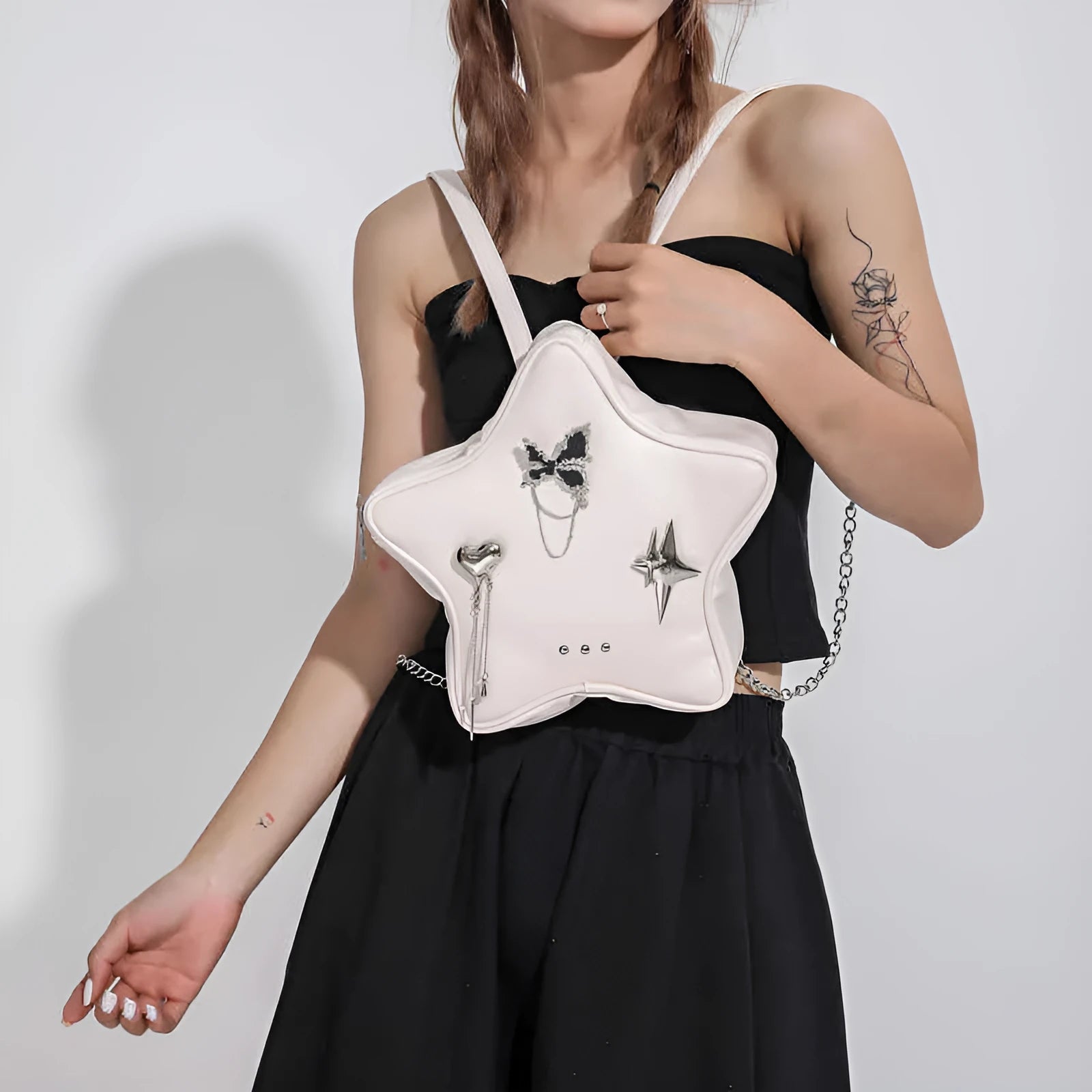 Soft black PU leather women's shoulder bag worn cross-body and as a mini backpack