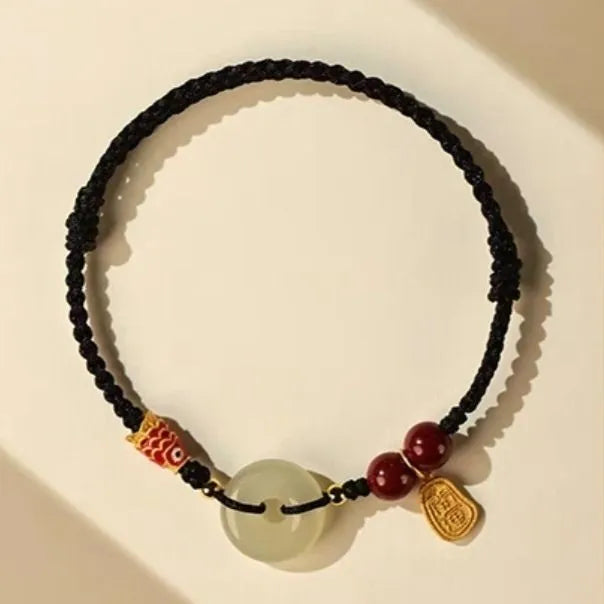 Handmade bracelet with jade peace buckle on black, colourful, or red braided rope.