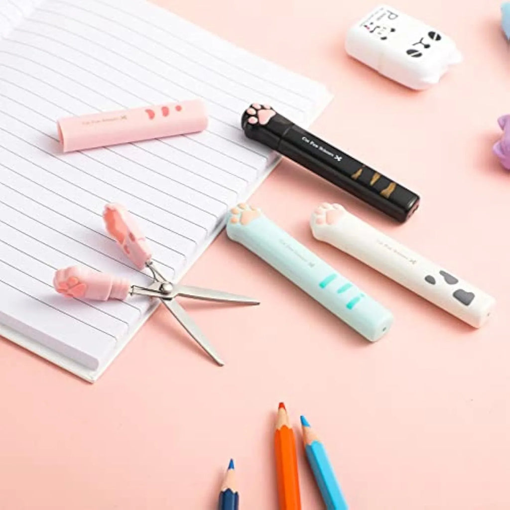 Small folding cat paw mini scissors with stainless steel blade in pink, white, black, and blue colour options.