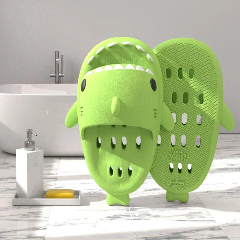 Shark-inspired shower slides with drain holes, featuring authentic shark design details and quick-drying EVA material