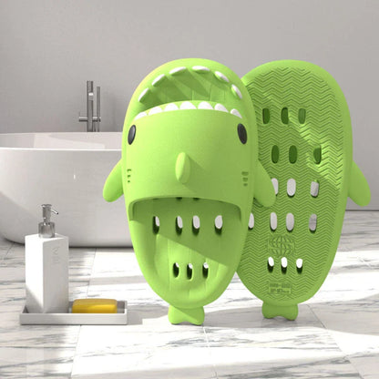 Shark-inspired shower slides with drain holes, featuring authentic shark design details and quick-drying EVA material