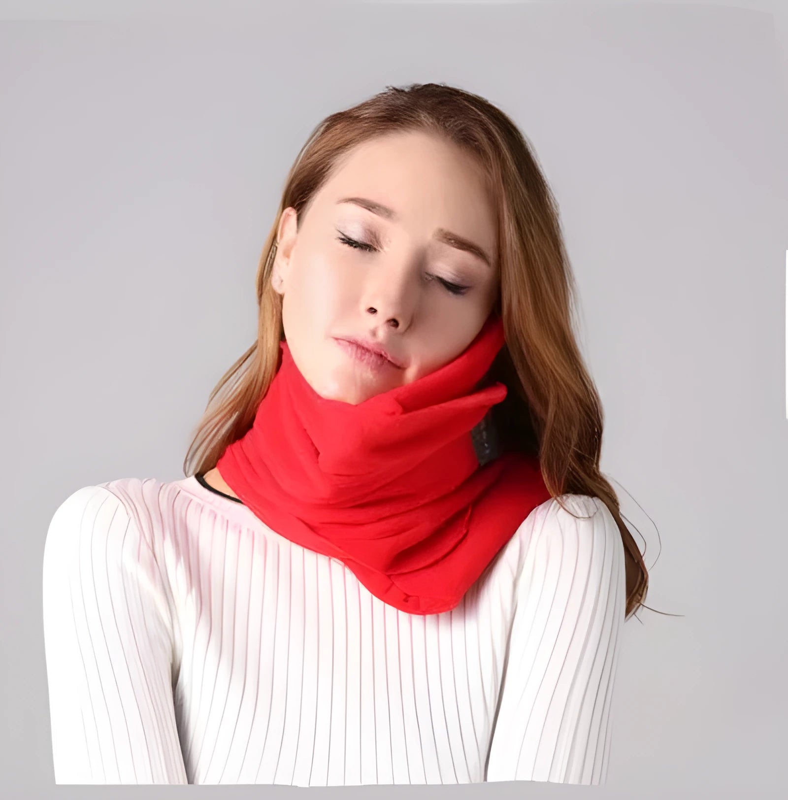 Black U-shaped convex travel neck pillow filled with cotton, shown on a grey background.