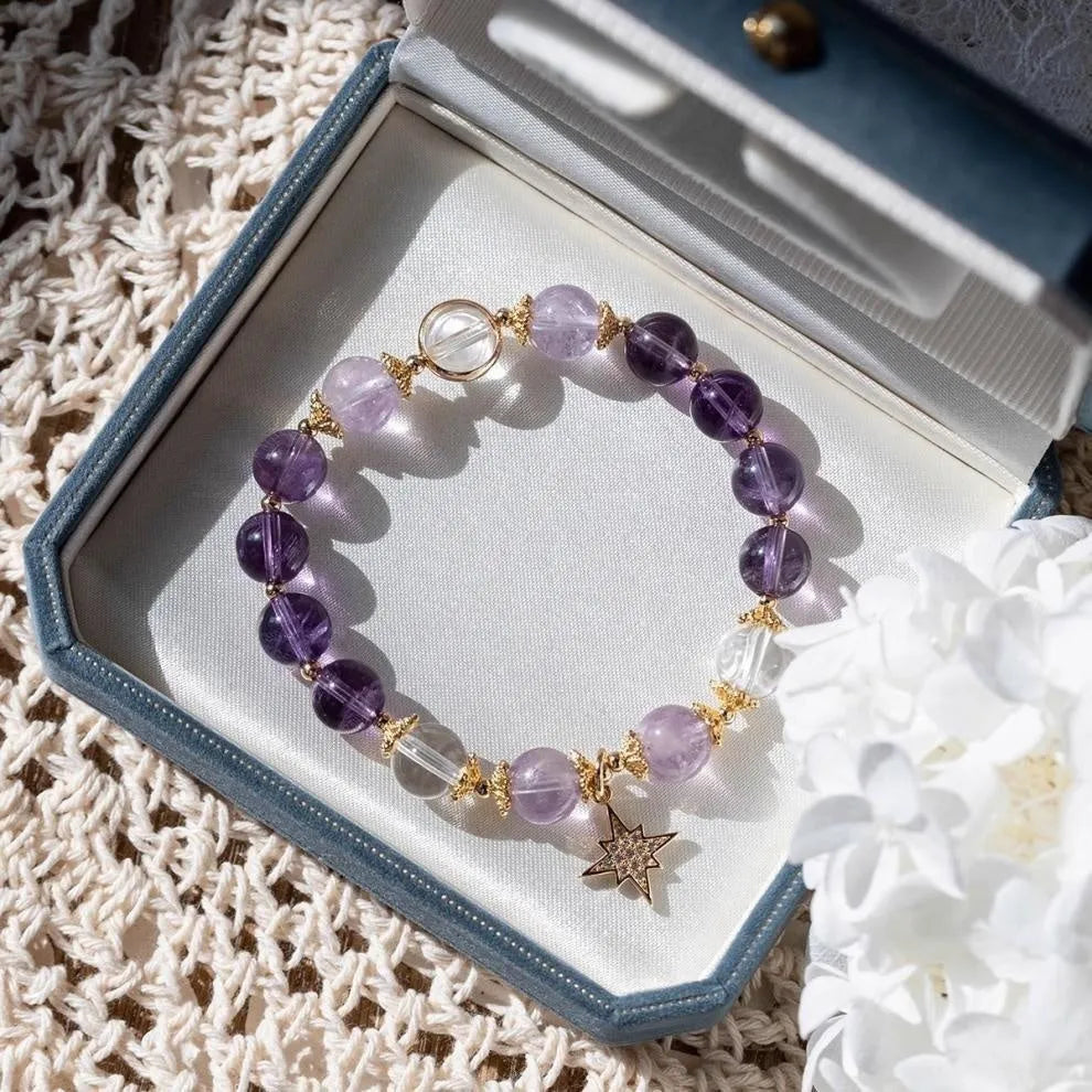 Handmade purple amethyst eight Awn star crystal bracelet for women in a gift box.