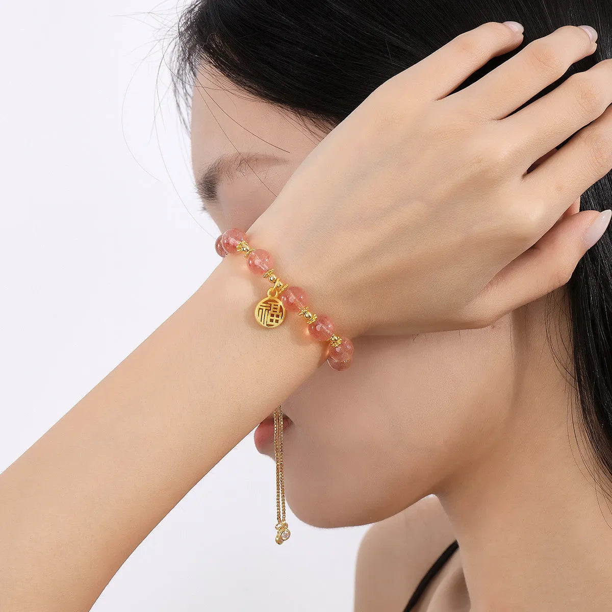 Women's Strawberry Quartz crystal bracelet with geometric design and Fu character, electroplated metallic finish