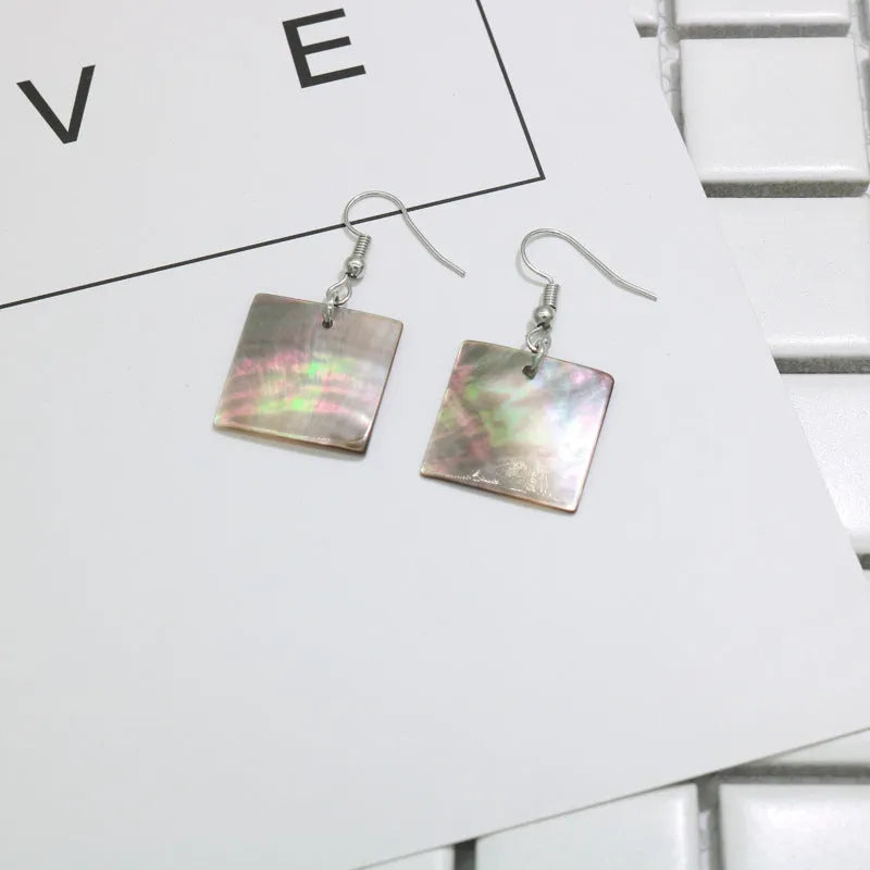 Natural shell geometric earrings in square panther and rectangular shell designs