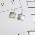 Natural shell geometric earrings in square panther and rectangular shell designs
