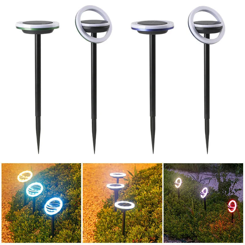 Solar-powered rotating lawn light with 12 LEDs in garden setting