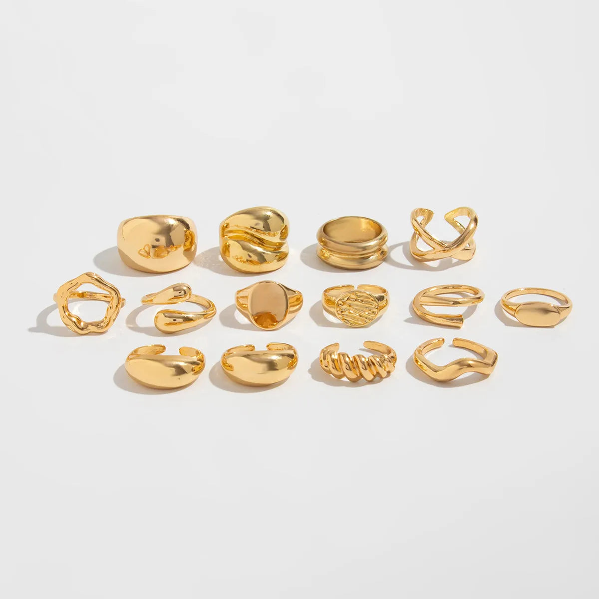 14 piece adjustable geometric ring set in Gold or White K with open-mouth alloy bands