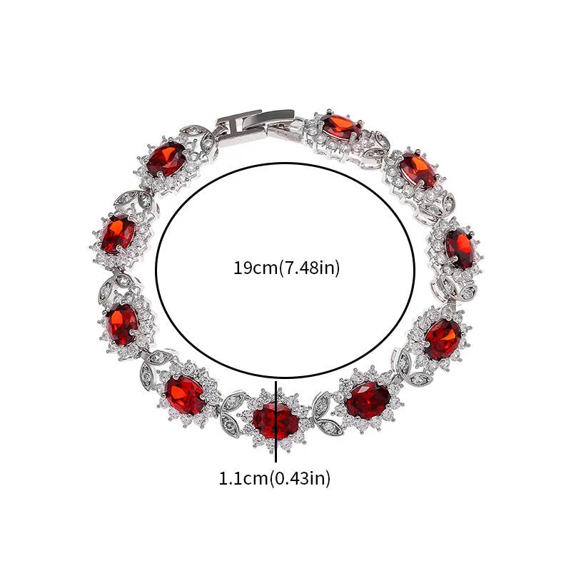 Simple electroplated alloy bracelet for women with inlaid zircon stone in one of nine colour options including ruby, emerald, and black onyx.