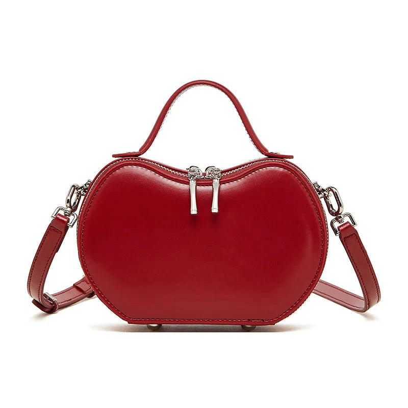 Creative fruit leather heart shape cowhide messenger bag in light brown with single shoulder strap