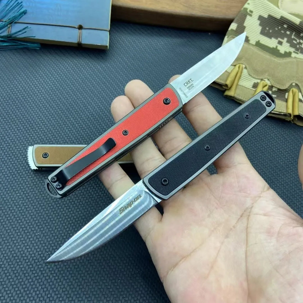Folding fruit knife with stainless steel blade shown in black, red, and coffee colour variations