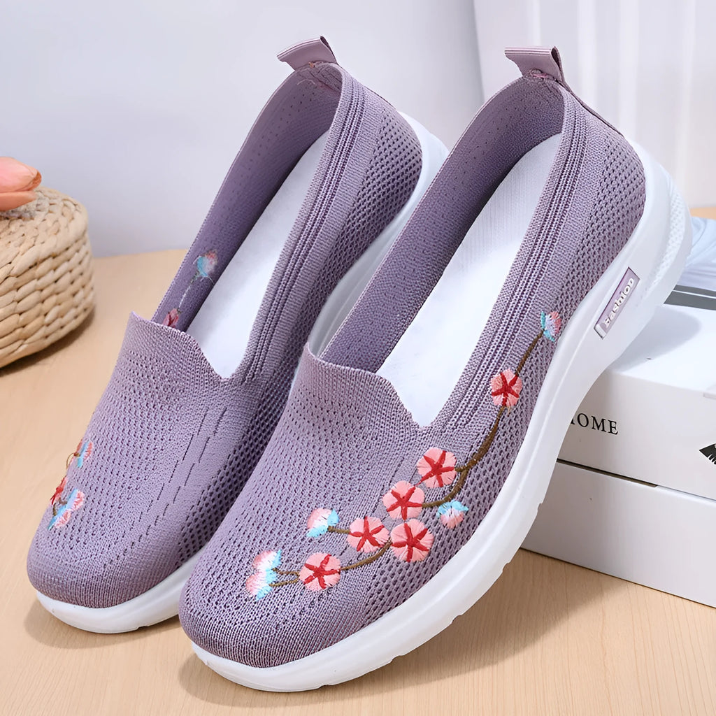 Women's embroidered woven casual pump in wine red with a low heel and anti-slip sole.