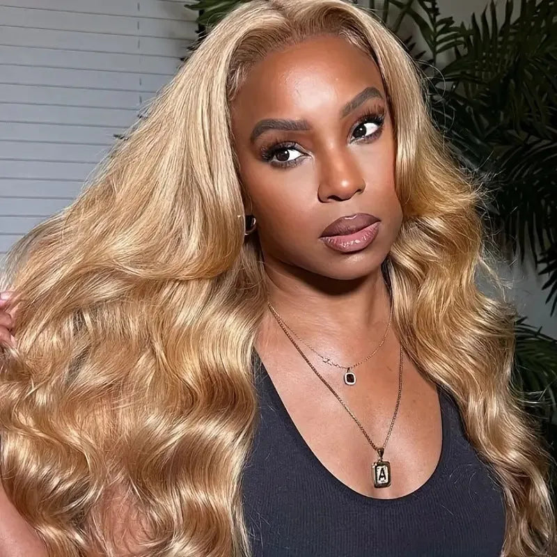 Synthetic wig with big golden wave curls and side bangs in light brown colour