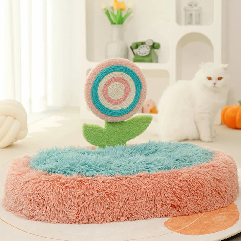 Pink elliptical plush cat bed with removable cover for small to medium cats