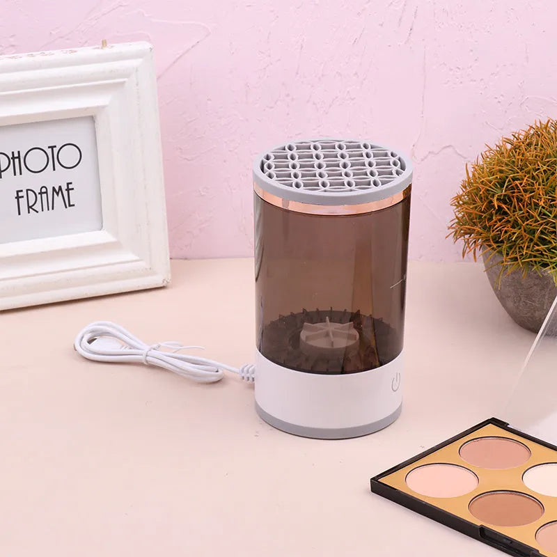 Grey and white portable electric makeup brush cleaner with USB charging cable