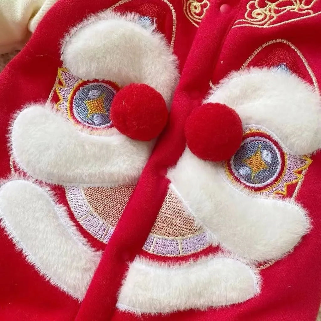 Red embroidered lion dance costume with velvet and cotton on display showing long climbing style