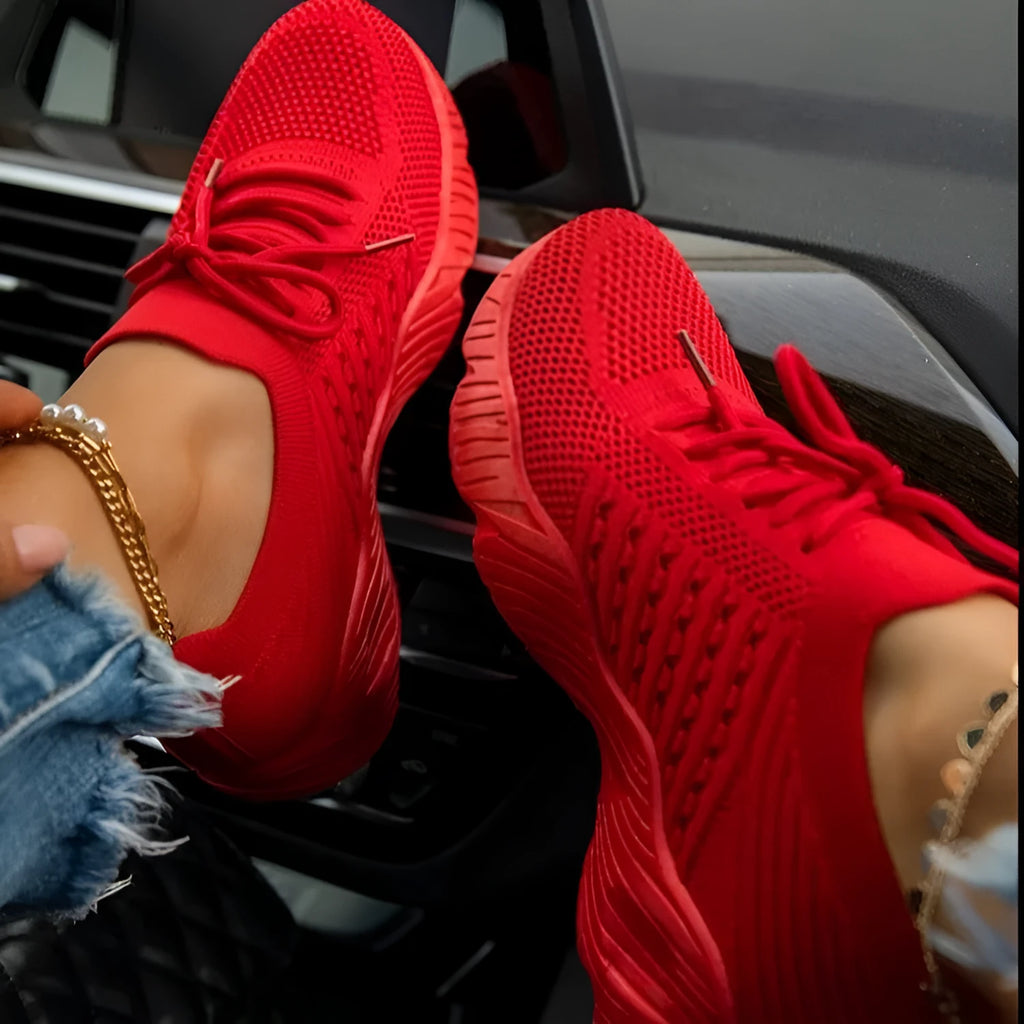 Women's solid colour sneakers with a thick sole, shown in one of nine available colours.