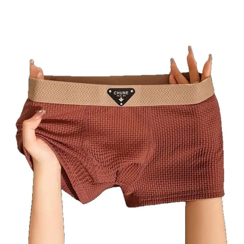 Men's ice silk nylon mid-waist boxer shorts in breathable sport style, available in multiple colours