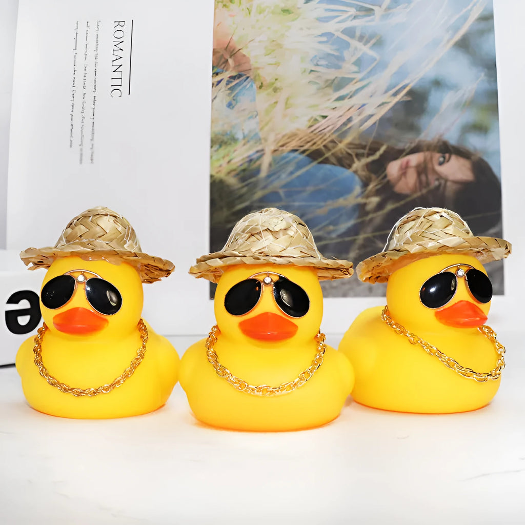 Yellow cartoon duck wearing straw hat car dashboard decoration with adhesive gel and sunglasses accessory