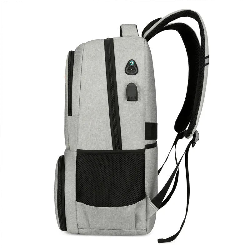 Light grey insulated Oxford cloth backpack with curved shoulder straps and a pull rod belt accessory