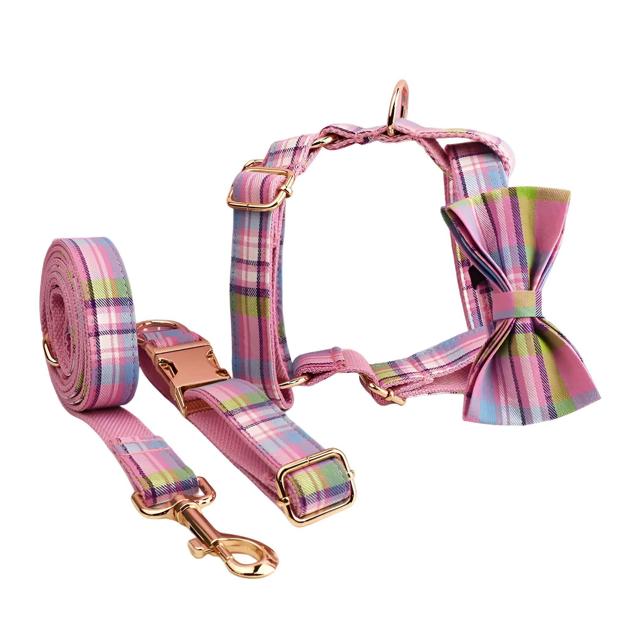 Four-piece cloth dog accessory set showing collar, leash, vest, and bow for coordinated pet styling