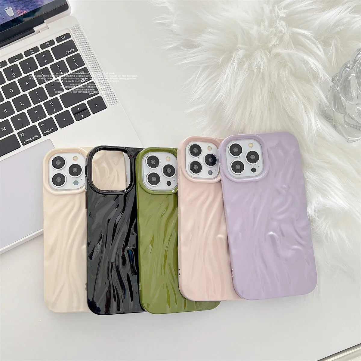 High-grade silicone iPhone case with a water ripple texture in beige white colour on a table.