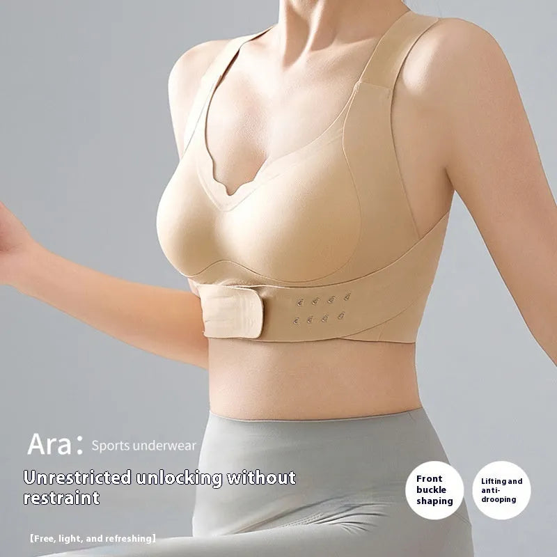 Women's nylon yoga bra with front buckle closure and contoured back.