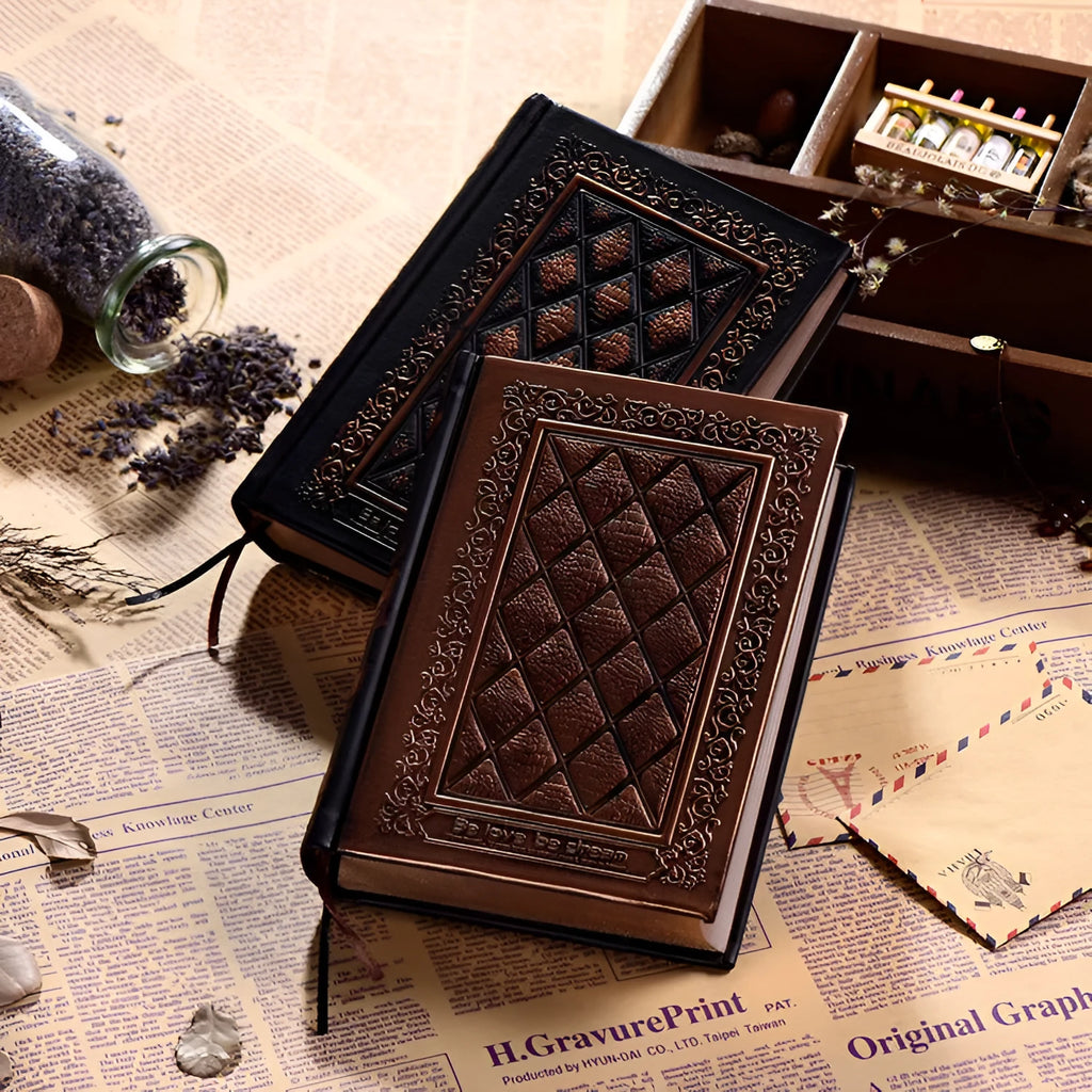 Embossed faux leather notebook with textured cover in bronze or black gold colour with thick writing pad