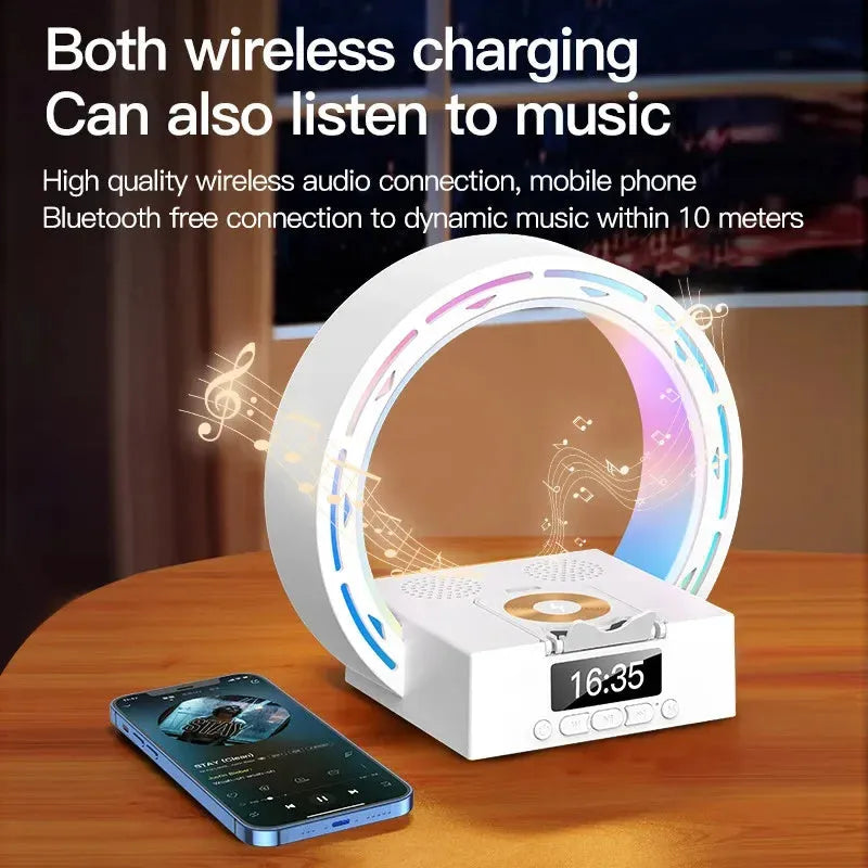 White multifunctional Bluetooth speaker with wireless charging pad, bedside lamp and digital clock display on wooden table