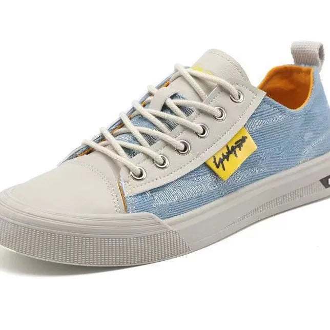 Men's black canvas lace-up shoes with a round toe and white rubber sole.