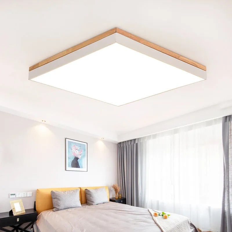 Round solid wood and acrylic LED ceiling lamp with Nordic design in white or grey.
