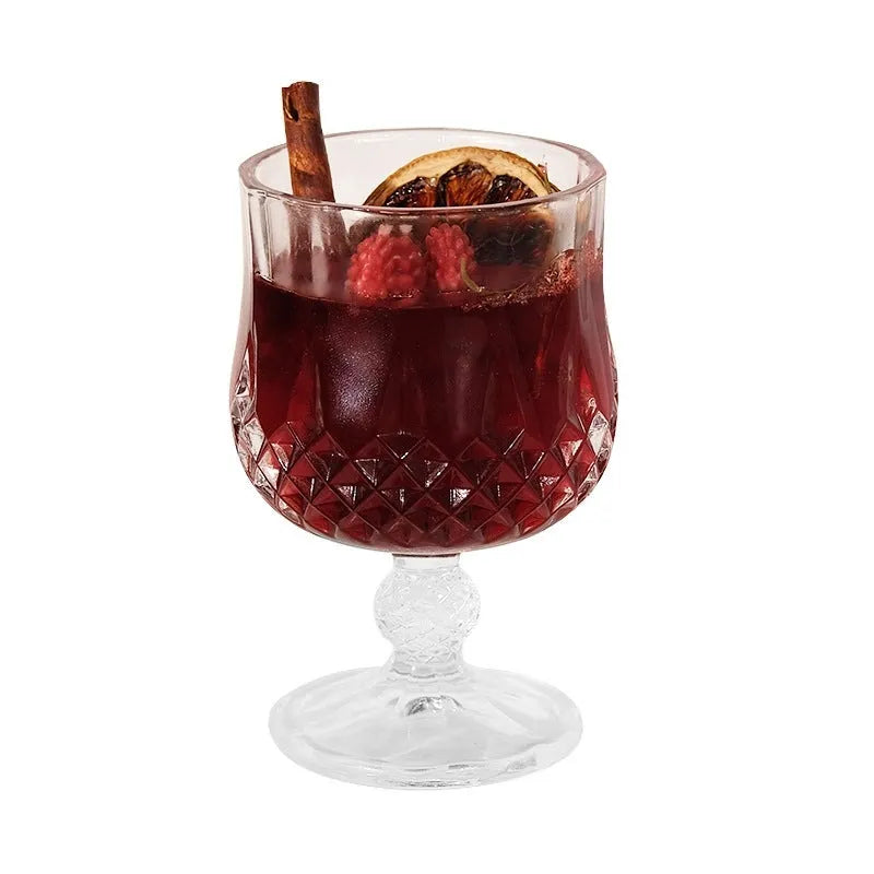 Glass wine goblet shaped aromatherapy candle with French mulled wine fragrance