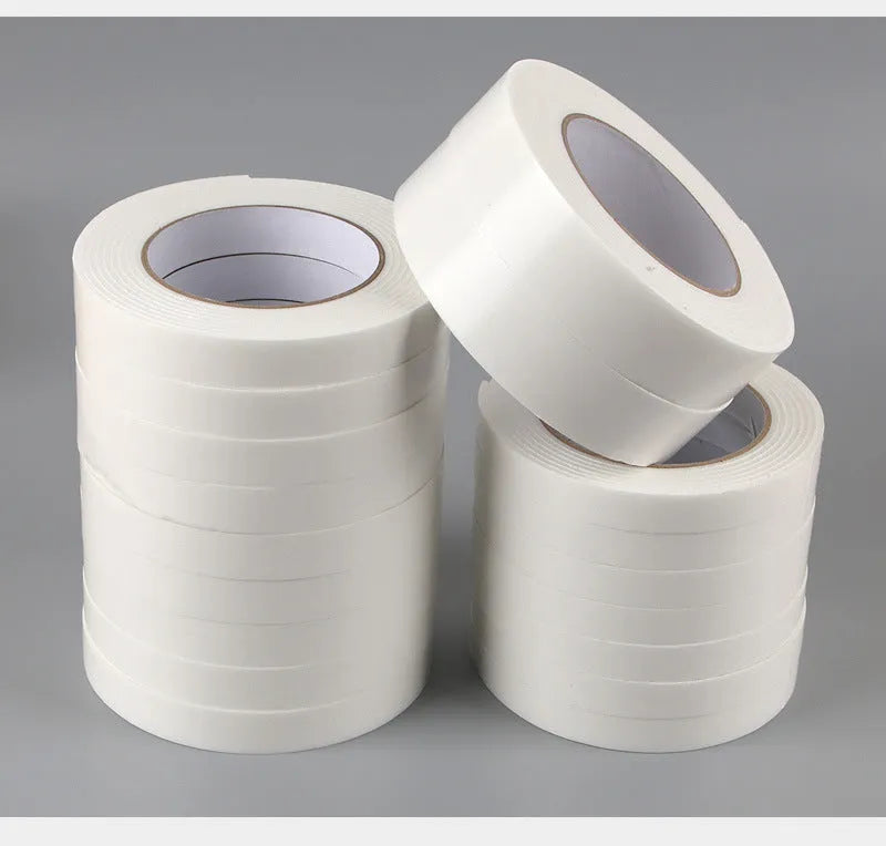 Roll of 3mm thick foam double-sided adhesive tape showing sponge core, with size options 15mm, 18mm, and 30mm wide.