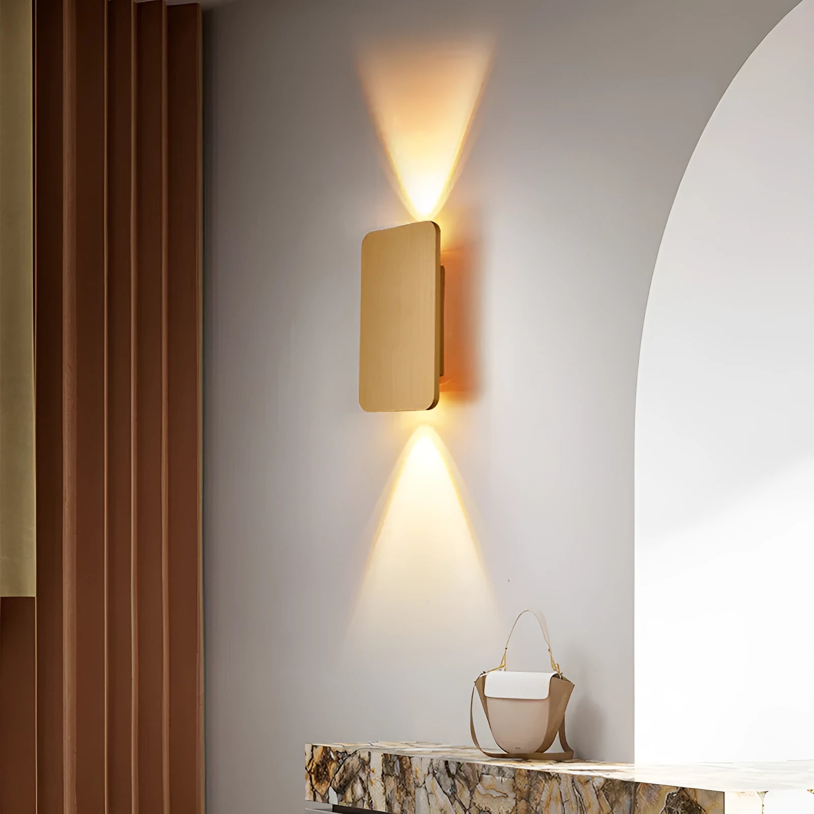 Minimalist modern wall lamp in black finish mounted beside a bed, showing its slim profile.