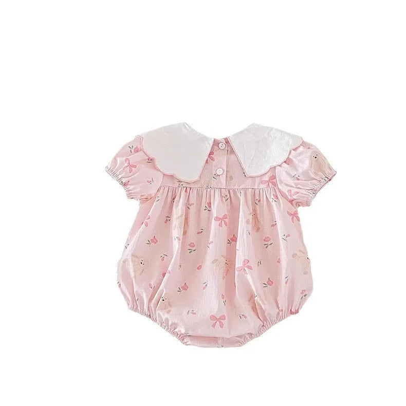 Pink cotton newborn triangle rompers with short sleeves and three bow details for summer outwear