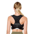 Black adjustable anti-humpback posture correction belt shown on a model, highlighting the straps and upper back coverage.
