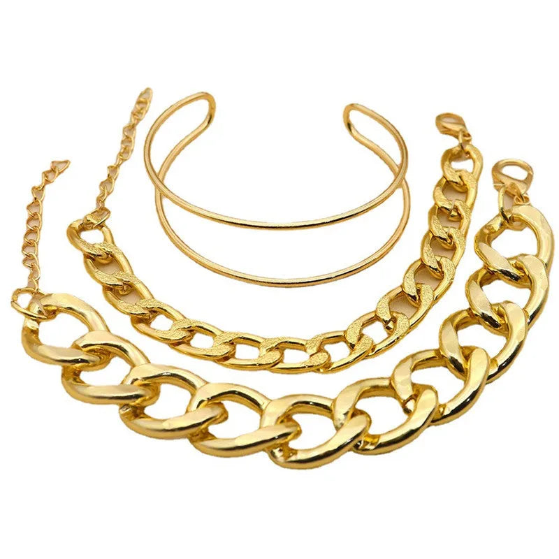 Three gold alloy double-layer thick chain bracelets with geometric design laid out flat