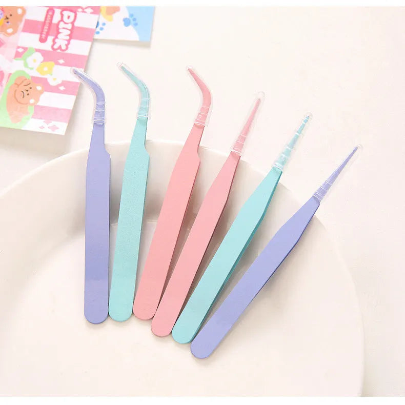 Set of DIY coloured pointed and elbow tweezers in pink blue and purple