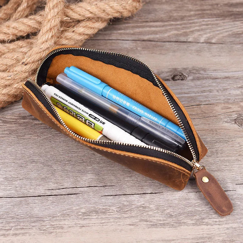 Square handmade cowhide leather pencil case with zipper in black, brown, dark brown, or yellow.