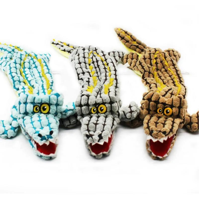 Blue plush crocodile dog toy with corduroy fabric texture and squeaker for interactive play