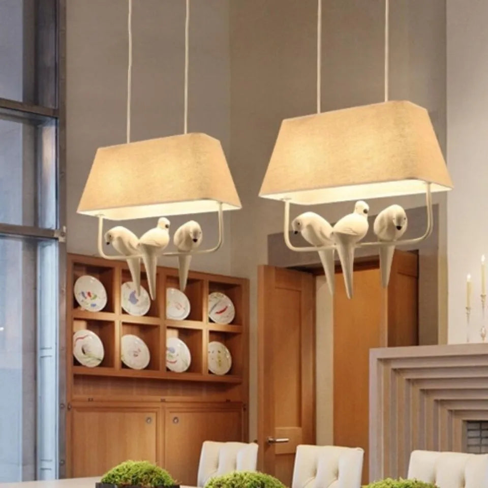 Iron bird chandelier ceiling lamp with fabric shade in a multi-bird design