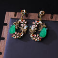 Light luxury distressed alloy earrings with diamond-embedded resin flower and Chinese style garland eardrop design