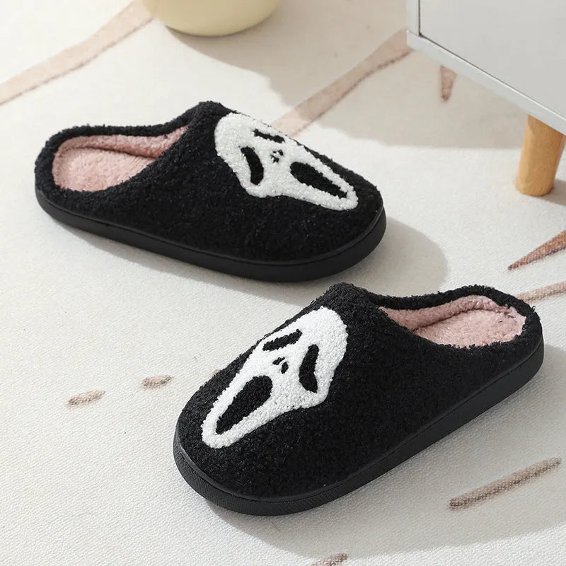 Halloween skull print indoor slippers with suede upper, cotton lining, and non-slip rubber sole in white, red, black, or red black.