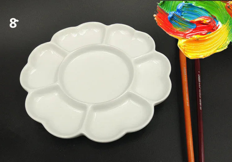 White ceramic painting palette with plum blossom design, shown in 6 inch, 7 inch, and 8 inch size options.