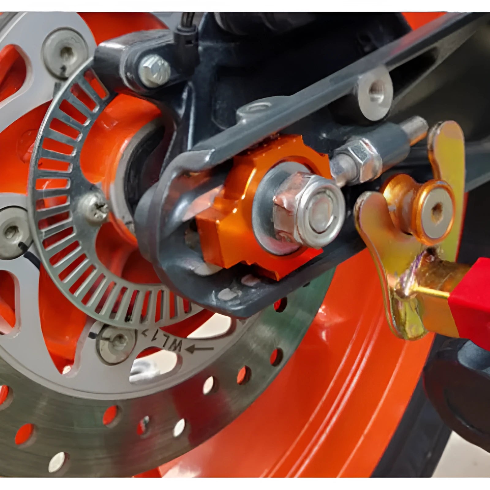Orange motorcycle regulator screws for KTM DUKE rear fork modification