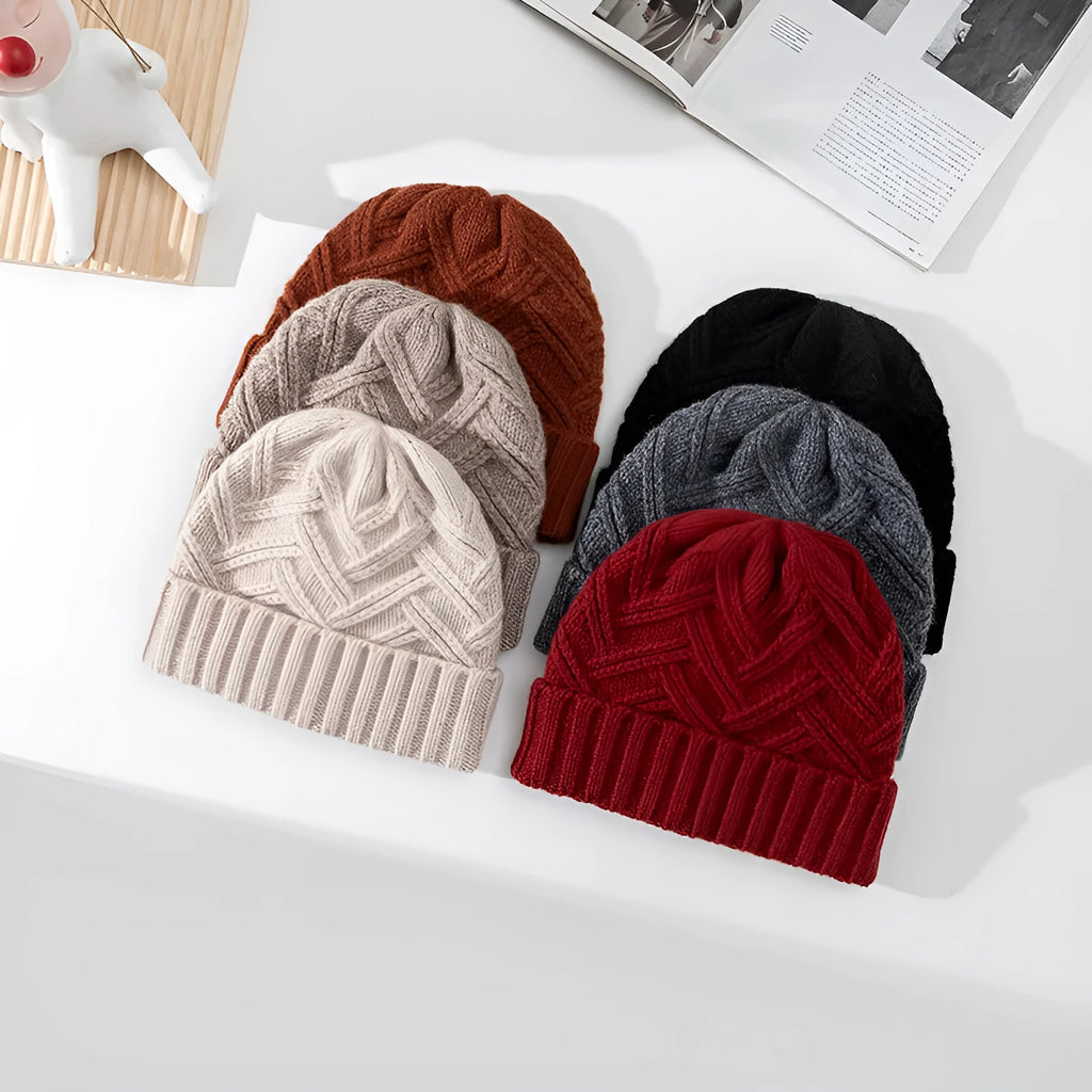 Wool knitted women's winter hat with dome crown and totem pattern in ivory white colour